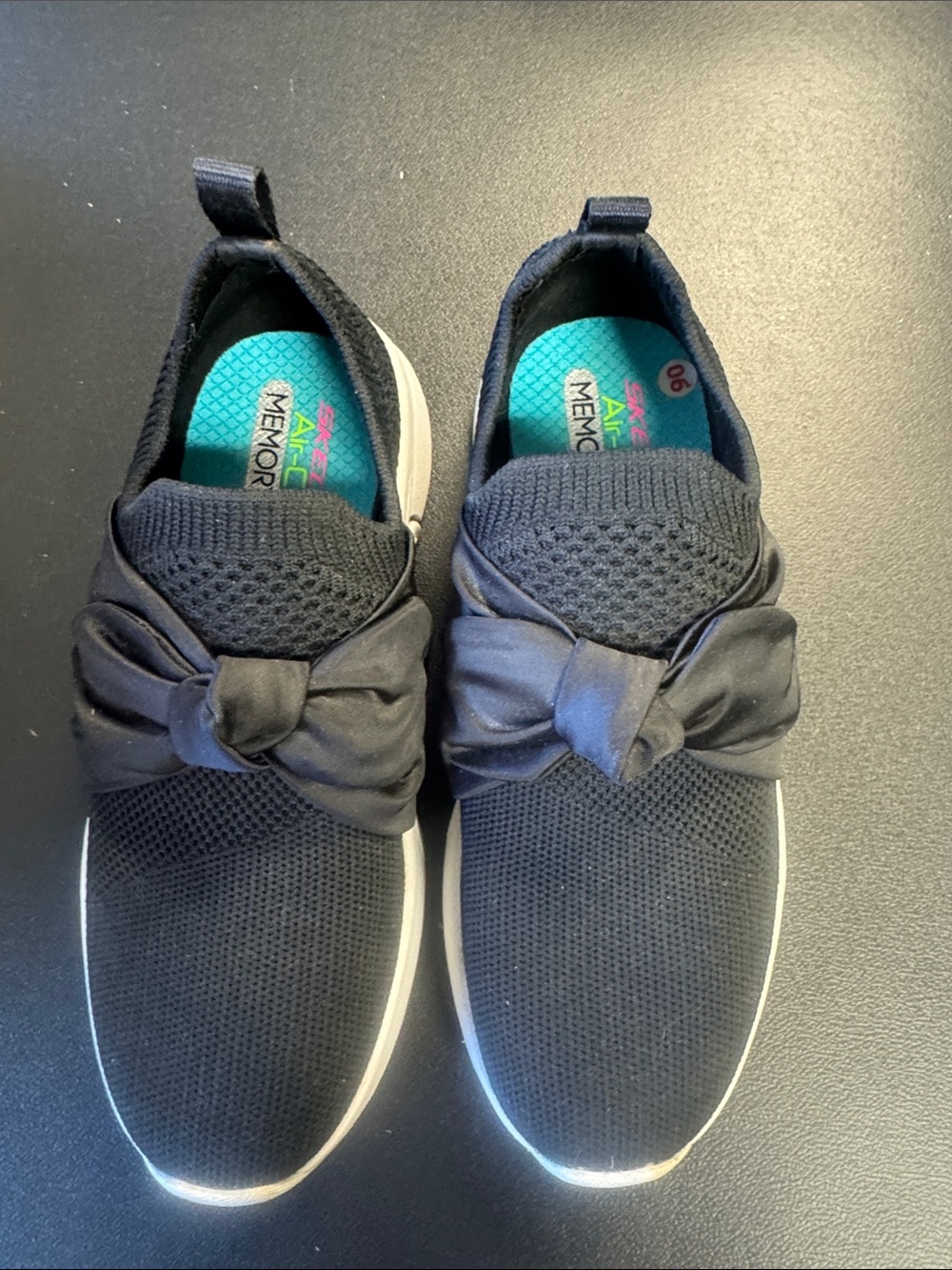 Skechers Girls Black Slip-On Knit Sneakers with Bow Accent